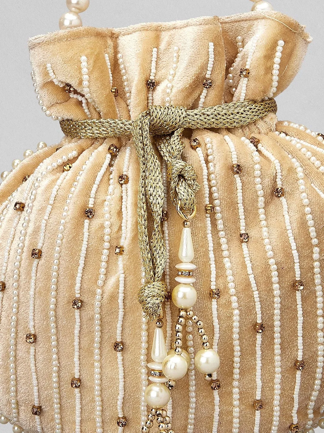Rubans Cream Coloured Velvet Potli Bag With Pearls And Golden Beads